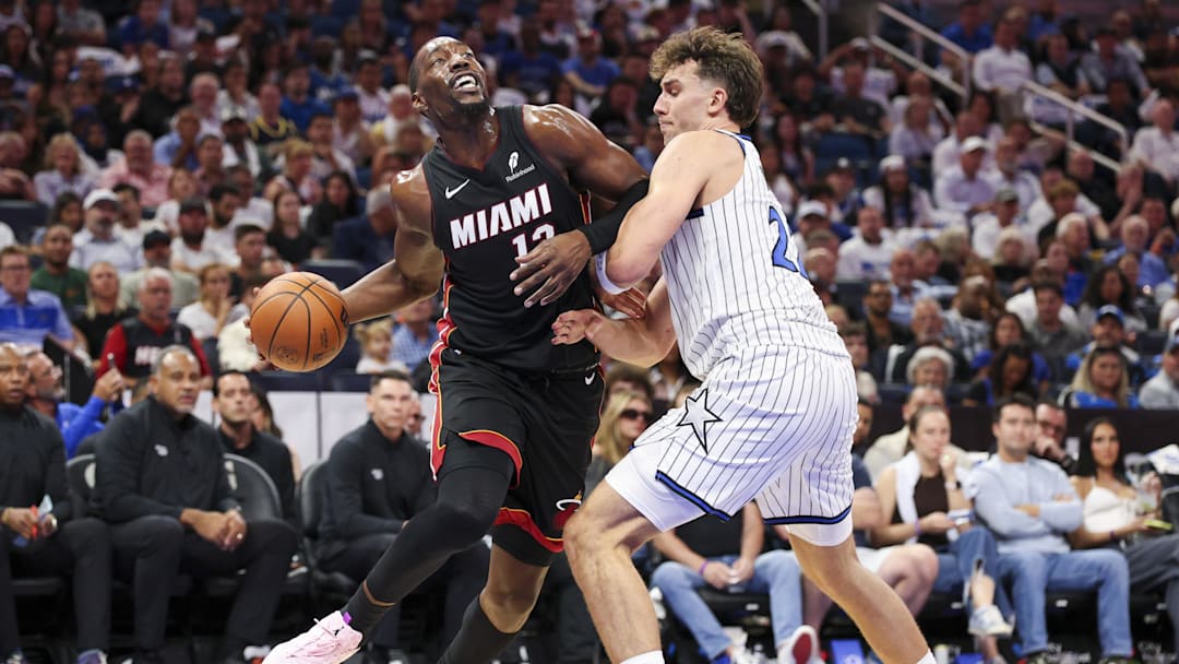 Oct 22, 2025; Orlando, Florida, USA; Miami Heat center Bam Adebayo (13) is guarded by Orlando Magic forward Franz Wagner (22) in the second quarter at Kia Center. Mandatory Credit: Nathan Ray Seebeck-Imagn Images Oct 22, 2025; Orlando, Florida, USA; Miami Heat center Bam Adebayo (13) is guarded by Orlando Magic forward Franz Wagner (22) in the second quarter at Kia Center. Mandatory Credit: Nathan Ray Seebeck-Imagn Images