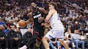 Oct 22, 2025; Orlando, Florida, USA; Miami Heat center Bam Adebayo (13) is guarded by Orlando Magic forward Franz Wagner (22) in the second quarter at Kia Center. Mandatory Credit: Nathan Ray Seebeck-Imagn Images
