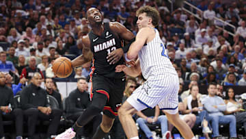 Oct 22, 2025; Orlando, Florida, USA; Miami Heat center Bam Adebayo (13) is guarded by Orlando Magic forward Franz Wagner (22) in the second quarter at Kia Center. Mandatory Credit: Nathan Ray Seebeck-Imagn Images
