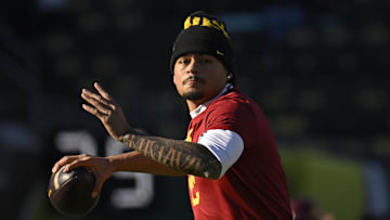Nov 22, 2025; Eugene, Oregon, USA; Southern California Trojans quarterback Jayden Maiava (14) warms up before the game against the Oregon Ducks at Autzen Stadium. Mandatory Credit: Troy Wayrynen-Imagn Images