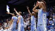The North Carolina Tar Heels bench celebrate after the game against the San Diego State Aztecs at UD Arena. 