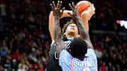 Cincinnati Bearcats guard Dan Skillings Jr. (0) goes in for a layup in the first half of a NCAA men’s basketball game between the Cincinnati Bearcats and Dayton Flyers, Friday, Dec. 20, 2024, at Heritage Bank Center in downtown Cincinnati.