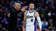 Mar 27, 2025; Sacramento, California, USA; Sacramento Kings interim head coach Doug Christie talks to guard Zach LaVine (8) during the fourth quarter against the Portland Trail Blazers at Golden 1 Center. Mandatory Credit: Sergio Estrada-Imagn Images