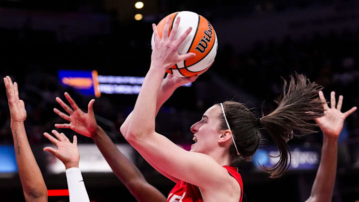 Indiana Fever guard Caitlin Clark (22) goes up for a shot Sunday, Sept. 8, 2024, during a game between the Indiana Fever and the Atlanta Dream at Gainbridge Fieldhouse in Indianapolis. The Fever defeated the Dream in overtime, 104-100.