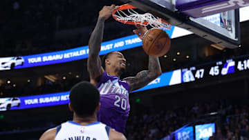 Nov 14, 2024; Salt Lake City, Utah, USA; Utah Jazz forward John Collins (20) dunks the ball against the Dallas Mavericks during the second quarter at Delta Center. Mandatory Credit: Rob Gray-Imagn Images