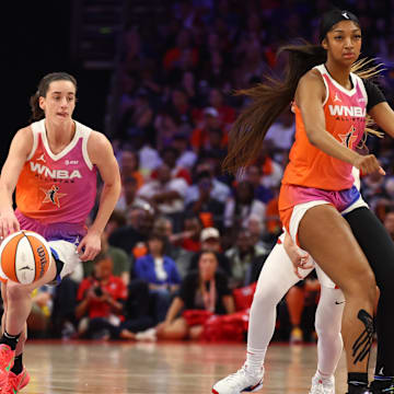 Team WNBA guard Caitlin Clark (left) and Angel Reese (right)