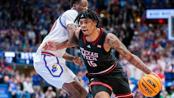 Mar 1, 2025; Lawrence, Kansas, USA; Texas Tech Red Raiders forward JT Toppin (15) drives to the basket during the first half against the Kansas Jayhawks at Allen Fieldhouse. Mandatory Credit: William Purnell-Imagn Images