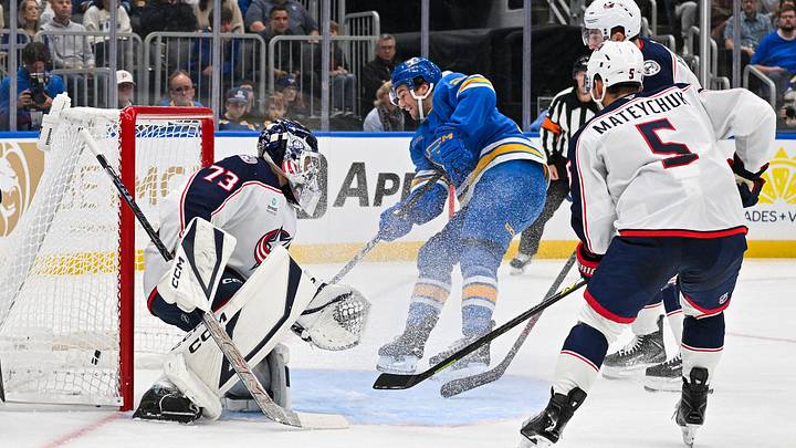 Oct 10, 2026; St. Louis, Missouri, USA; St. Louis Blues right wing Jimmy Snuggerud (21) shoots and scores against Columbus Blue Jackets goaltender Jet Greaves (73) during the second period at Enterprise Center. Mandatory Credit: Jeff Curry-Imagn Images