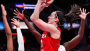 Indiana Fever guard Caitlin Clark (22) goes up for a shot