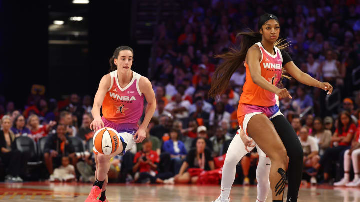 Jul 20, 2024; Phoenix, AZ, USA; Team WNBA guard Caitlin Clark and Angel Reese against the USA Women's National Team during the 2024 WNBA All Star Game at Footprint Center.