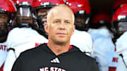 Sep 11, 2025; Winston-Salem, North Carolina, USA;  North Carolina State Wolfpack head coach Dave Doeren walks his team out on the field against the Wake Forest Demon Deacons at Allegacy Federal Credit Union Stadium. Mandatory Credit: Luke Jamroz-Imagn Images
