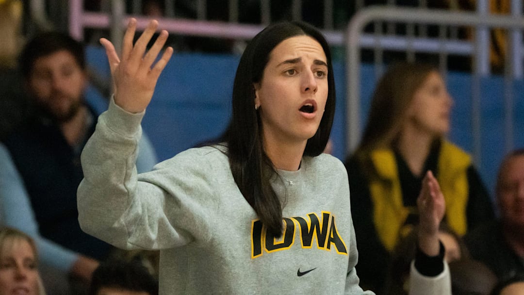 Former Iowa women's basketball player Caitlin Clark reacts after a foul call on Iowa during the Drake vs. Iowa basketball game at Knapp Center on Sunday, Nov. 17, 2024, in Des Moines.