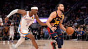 Jan 29, 2025; San Francisco, California, USA; Golden State Warriors guard Stephen Curry (30) dribbles past Oklahoma City Thunder guard Shai Gilgeous-Alexander (2) in the third quarter at the Chase Center. Mandatory Credit: Cary Edmondson-Imagn Images