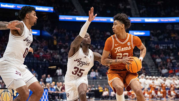 Texas A&M Aggies guard Jace Carter and Texas A&M Aggies guard Manny Obaseki guard Texas Longhorns forward Devon Pryor