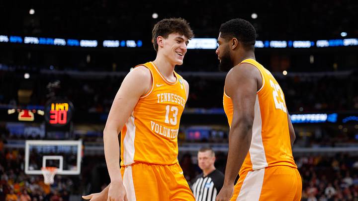 Mar 27, 2026; Chicago, IL, USA; Tennessee Volunteers forward Jaylen Carey (23) celebrates with forward J.P. Estrella (13)  in the second half against the Iowa State Cyclones during a Sweet Sixteen game of the Midwest Regional of the men's 2026 NCAA Tournament at United Center. Mandatory Credit: Kamil Krzaczynski-Imagn Images