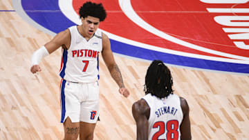 Dec 19, 2021; Detroit, Michigan, USA; Detroit Pistons guard Killian Hayes (7) celebrates with center Isaiah Stewart