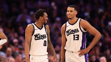 Mar 14, 2025; Phoenix, Arizona, USA; Sacramento Kings guard Malik Monk (0) and forward Keegan Murray (13) against the Phoenix Suns at Footprint Center. Mandatory Credit: Mark J. Rebilas-Imagn Images