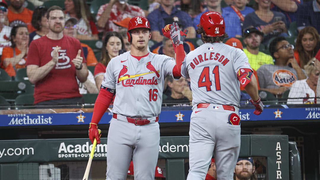 Jun 3, 2024; Houston, Texas, USA; St. Louis Cardinals right fielder Alec Burleson (41) celebrates with second baseman Nolan Gorman (16) after hitting a home run during the first inning against the Houston Astros at Minute Maid Park. Mandatory Credit: Troy Taormina-Imagn Images