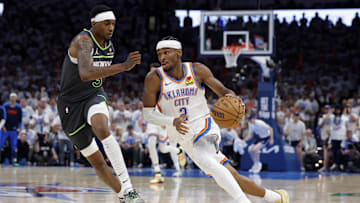 Oklahoma City Thunder guard Shai Gilgeous-Alexander against Minnesota Timberwolves forward Jaden McDaniels in NBA Playoffs