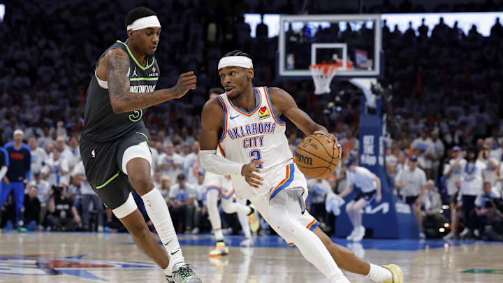 Oklahoma City Thunder guard Shai Gilgeous-Alexander against Minnesota Timberwolves forward Jaden McDaniels in NBA Playoffs