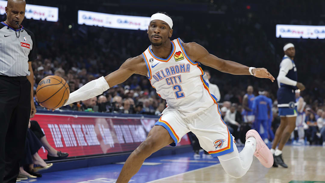 Mar 15, 2026; Oklahoma City, Oklahoma, USA; Oklahoma City Thunder guard Shai Gilgeous-Alexander (2) reaches to save the ball from going out of bounds on a play against the Minnesota Timberwolves during the first half at Paycom Center. Mandatory Credit: Alonzo Adams-Imagn Images