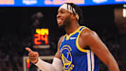 Mar 17, 2025; San Francisco, California, USA; Golden State Warriors guard Buddy Hield (7) smiles after a basket as a time out is called during the first quarter against the Denver Nuggets at Chase Center. Mandatory Credit: Kelley L Cox-Imagn Images