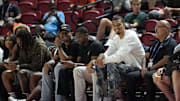 Jul 10, 2025; Las Vegas, NV, USA; San Antonio Spurs player Victor Wembanyama sits courtside during the Spurs and Philadelphia 76ers game at Thomas & Mack Center. Mandatory Credit: Candice Ward-Imagn Images