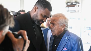 Jan 17, 2024; Foxborough, MA, USA; New England Patriots owner Robert Kraft (R) speaks to head coach Jerod Mayo at a press conference at Gillette Stadium. Mandatory Credit: Eric Canha-Imagn Images