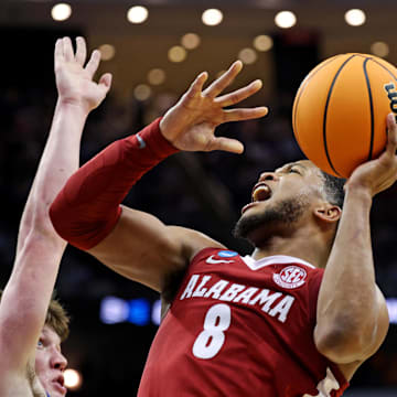 Mar 29, 2025; Newark, NJ, USA; Alabama Crimson Tide guard Chris Youngblood (8) shoots the ball against Duke Blue Devils guard Kon Knueppel (7) during the second half in the East Regional final of the 2025 NCAA tournament at Prudential Center.