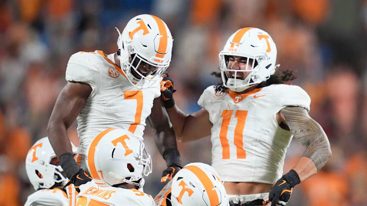 Tennessee linebacker Arion Carter (7) and Tennessee linebacker Keenan Pili (11) at the NCAA College football game between Tennessee and NC State on Saturday, Sept. 7, 2024 in Charlotte, NC.