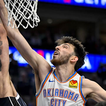 May 13, 2024; Dallas, Texas, USA; Oklahoma City Thunder forward Chet Holmgren (7) blocks a shot by Dallas Mavericks center Dereck Lively II (2) during the second half in game four of the second round for the 2024 NBA playoffs at American Airlines Center. Mandatory Credit: Jerome Miron-Imagn Images