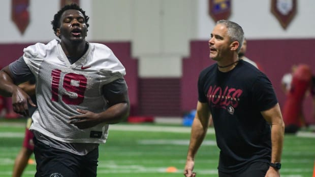 Florida State head coach Mike Norvell works during spring practices