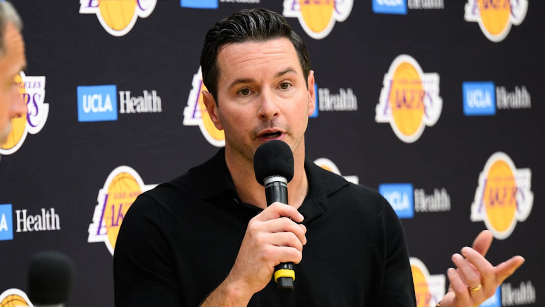 Sep 25, 2025; El Segundo, CA, USA; Los Angeles Lakers head coach JJ Redick, right, speaks during a press conference to preview the 2025-26 season at UCLA Health Training Center. Mandatory Credit: William Liang-Imagn Images