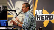 Feb 1, 2016; San Francisco, CA, USA; Radio personality Colin Cowherd broadcasts on radio row at the Moscone Center in advance of Super Bowl 50 between the Carolina Panthers and the Denver Broncos. 