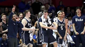 Jan 4, 2025; Dallas, Texas, USA;  Duke basketball guard Cooper Flagg (2) celebrates with teammates on the bench  during the second half against the Southern Methodist Mustangs at Moody Coliseum.