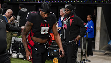 Jan 5, 2025; Atlanta, Georgia, USA; Atlanta Falcons quarterback Michael Penix Jr. (9) leaves the field after the Falcons lost to the Carolina Panthers in overtime at Mercedes-Benz Stadium. Mandatory Credit: Dale Zanine-Imagn Images