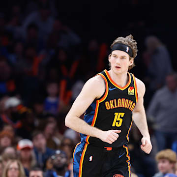 Jan 19, 2025; Oklahoma City, Oklahoma, USA; Oklahoma City Thunder center Branden Carlson (15) runs down the court against the Brooklyn Nets during the second half at Paycom Center. Mandatory Credit: Alonzo Adams-Imagn Images