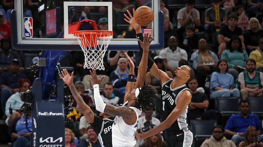 San Antonio Spurs forward Victor Wembanyama blocks a shot attempt by Memphis Grizzlies forward GG Jackson.