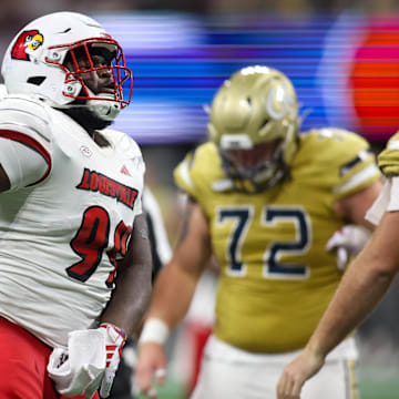 Sep 1, 2023; Atlanta, Georgia, USA; Louisville Cardinals defensive lineman Dezmond Tell (99) reacts against the Georgia Tech Yellow Jackets in the second half at Mercedes-Benz Stadium. Mandatory Credit: Brett Davis-Imagn Images