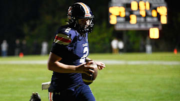 Nashville Christian quarterback Jared Curtis (2) runs the ball in for the go-ahead touchdown with 50 second left in game against Tyner Friday, Oct. 10, 2025, in Nashville, Tenn.