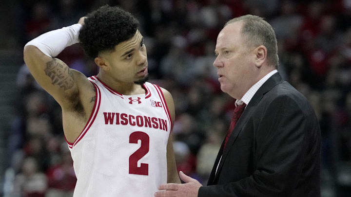 Wisconsin head coach Greg Gard talks with guard Nick Boyd (2) during the second half of their game Saturday, January 3, 2026 at the Kohl Center in Madison, Wisconsin. Purdue beat Wisconsin 89-73.
