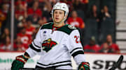 Apr 11, 2025; Calgary, Alberta, CAN; Minnesota Wild center Marco Rossi (23) against the Calgary Flames during the third period at Scotiabank Saddledome. Mandatory Credit: Sergei Belski-Imagn Images