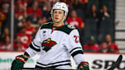 Apr 11, 2025; Calgary, Alberta, CAN; Minnesota Wild center Marco Rossi (23) against the Calgary Flames during the third period at Scotiabank Saddledome. Mandatory Credit: Sergei Belski-Imagn Images