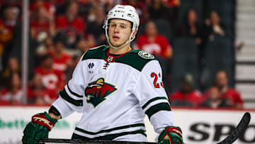 Apr 11, 2025; Calgary, Alberta, CAN; Minnesota Wild center Marco Rossi (23) against the Calgary Flames during the third period at Scotiabank Saddledome. Mandatory Credit: Sergei Belski-Imagn Images