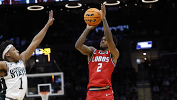 New Mexico Lobos guard Donovan Dent shoots the ball over Michigan State Spartans guard Jeremy Fears Jr. in the second half during the NCAA Tournament Second Round at Rocket Arena. 