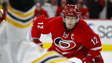 Feb 26, 2016; Raleigh, NC, USA;  Carolina Hurricanes forward Eric Staal (12) watches against the Boston Bruins at PNC Arena. The Boston Bruins defeated the Carolina Hurricanes 4-1. Mandatory Credit: James Guillory-Imagn Images