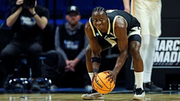 Mar 20, 2025; Lexington, KY, USA; Wofford Terriers guard Justin Bailey (5) reacts during the first half against the Tennessee Volunteersin the first round of the NCAA Tournament at Rupp Arena. Mandatory Credit: Jordan Prather-Imagn Images