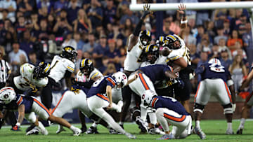 Oct 18, 2025; Auburn, Alabama, USA; Auburn Tigers kicker Alex McPherson (38) attempts a 40 yard field goal during the second quarter against the Missouri Tigers at Jordan-Hare Stadium. The kick was no good. Mandatory Credit: John Reed-Imagn Images
