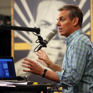 Feb 1, 2016; San Francisco, CA, USA; Radio personality Colin Cowherd broadcasts on radio row at the Moscone Center in advance of Super Bowl 50 between the Carolina Panthers and the Denver Broncos.