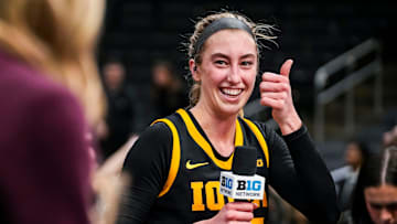 Iowa Hawkeyes guard Lucy Olsen (33) prepares for an interview Thursday, March 6, 2025, in a round two game at the 2025 TIAA Big Ten Women's Basketball Tournament between the Iowa Hawkeyes and the Michigan State Spartans at Gainbridge Fieldhouse in Indianapolis. The Hawkeyes defeated the Spartans, 74-61.